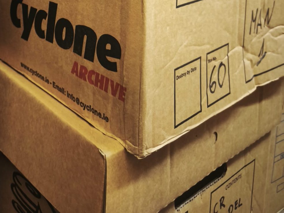 A stored archive box with its destroy-by date and box number fields